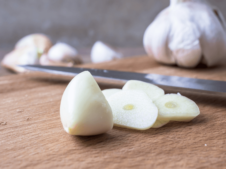 alt="Sliced garlic cloves for Korean BBQ"  

