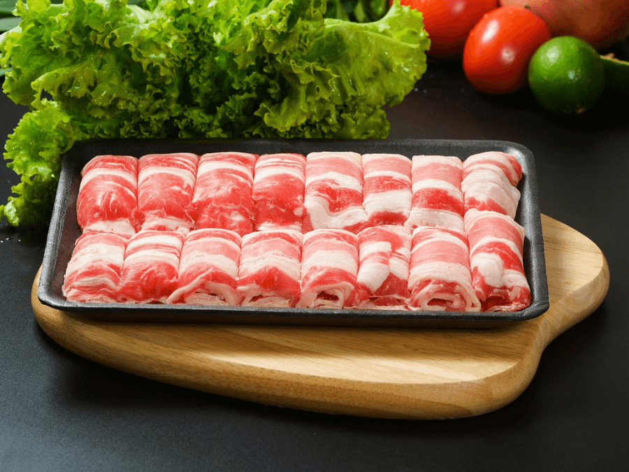 alt="Korean BBQ meat with beautiful marbling ready for grilling"  
