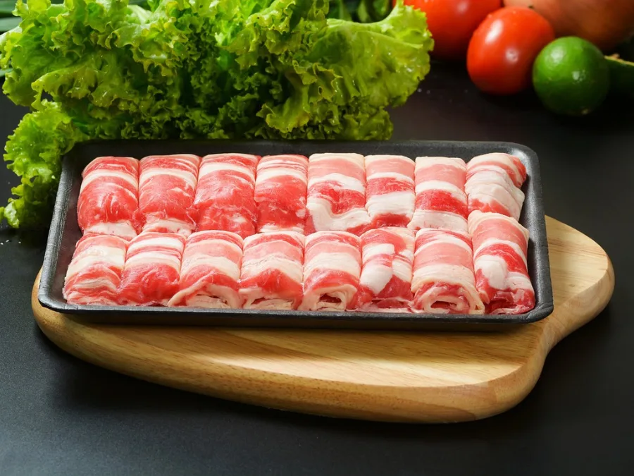 alt="Korean BBQ meat with beautiful marbling ready for grilling"
