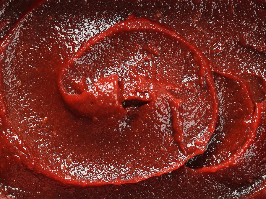 alt="Close-up of Korean gochujang red chili paste"